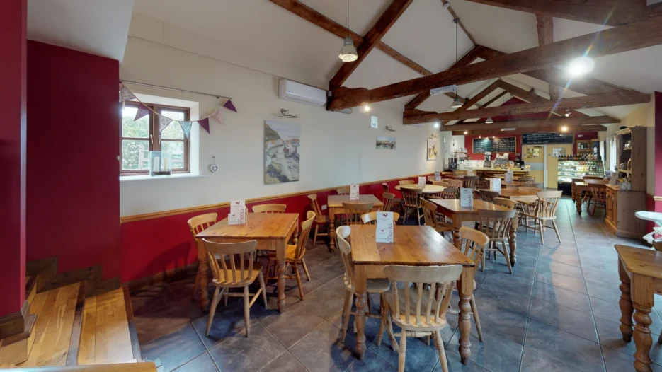 Matterport inside view of a café with exposed beams